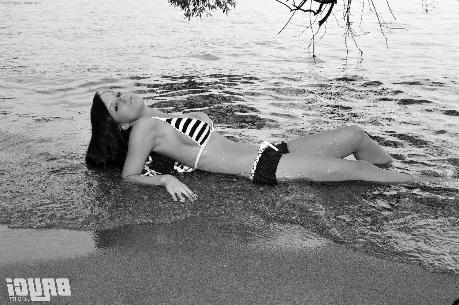 15P Pictures of Bryci flashing her tits in black and white