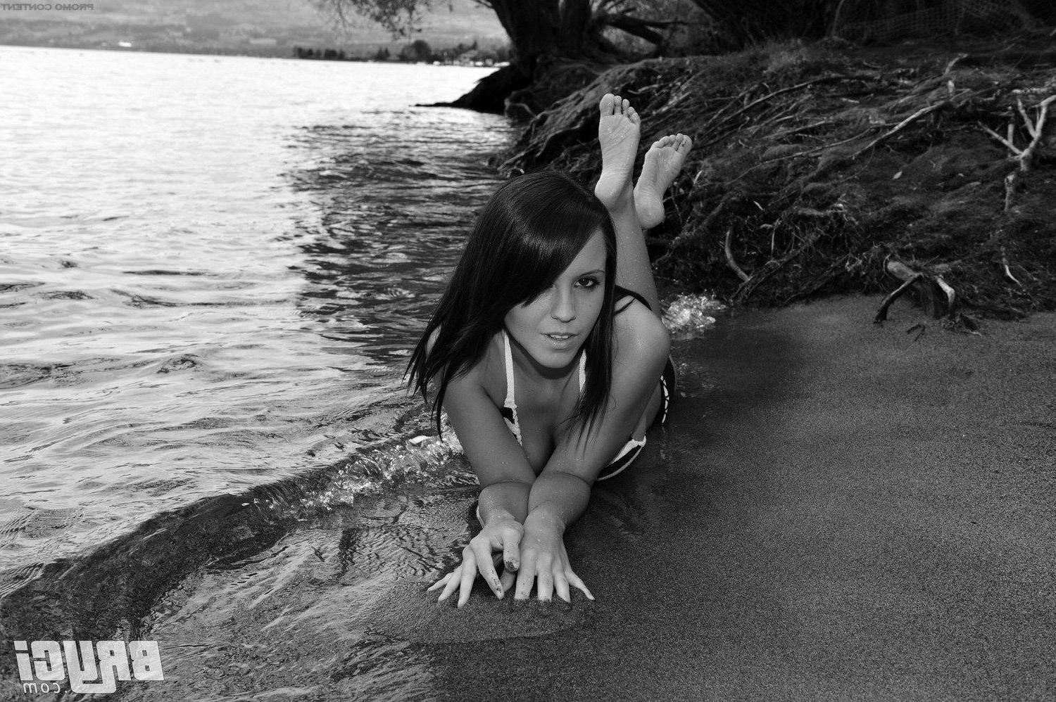 15P Pictures of Bryci flashing her tits in black and white