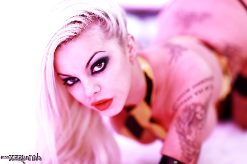 16P Busty tattooed hottie Delta White posing in stockings and lingerie