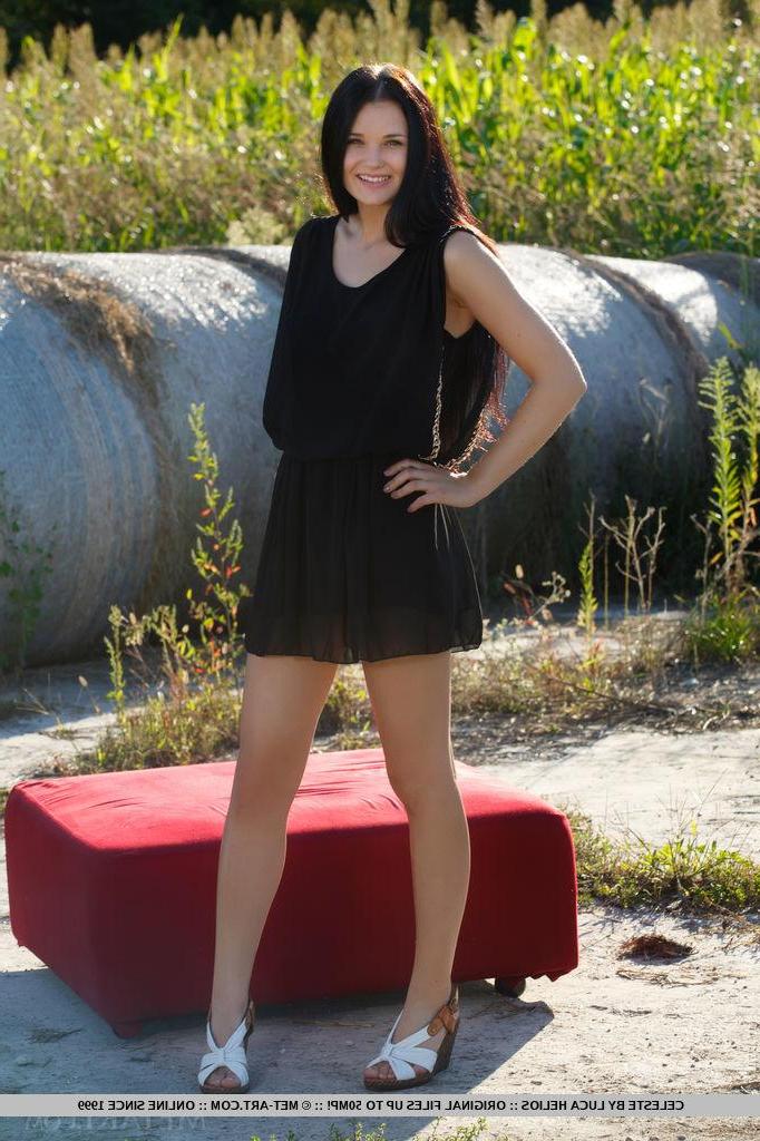 18P Beautiful brunette Celeste T strips out of her black dress in "Odveni"