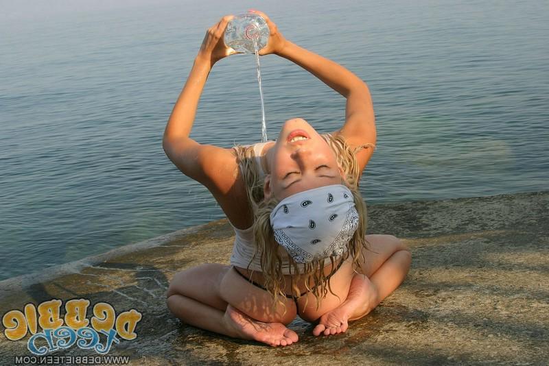 20P Pictures of Debbie Teen getting all wet