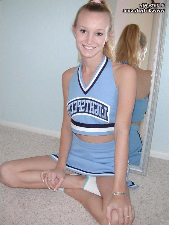 20P Pictures of a cheerleader stripping and spreading her legs