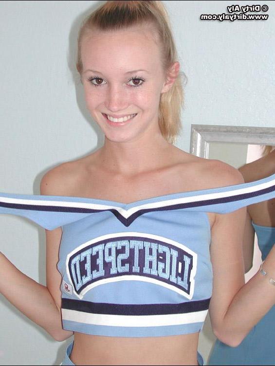 20P Pictures of a cheerleader stripping and spreading her legs