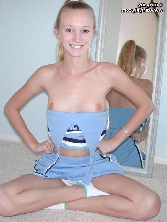 20P Pictures of a cheerleader stripping and spreading her legs