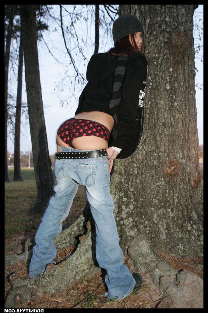 20P Pictures of Divinity 18 pulling down her jeans outside