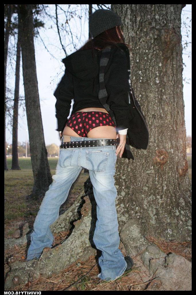 20P Pictures of Divinity 18 pulling down her jeans outside