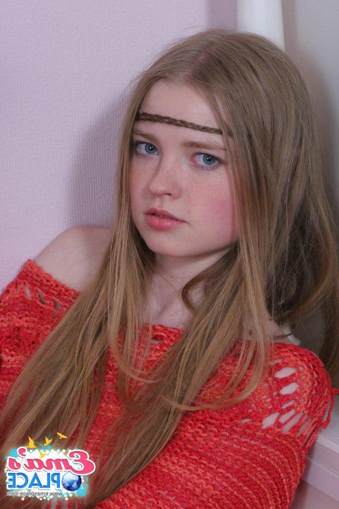 15P Pictures of teen Ema's Place showing off her small tits
