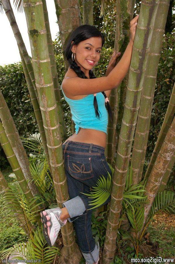 15P Pictures of teen cutie Gigi Spice playing with herself outside