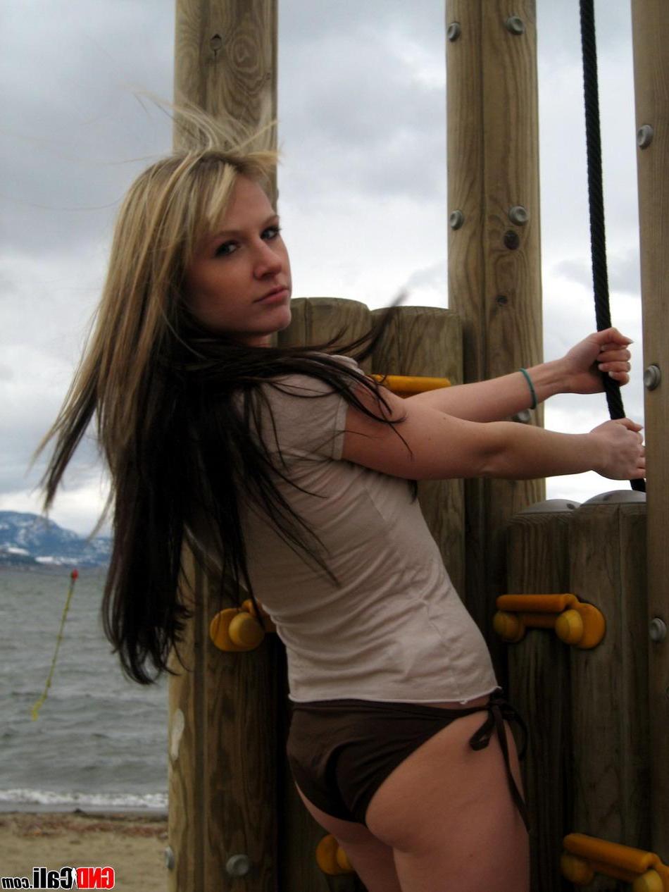16P Pictures of teen star GND Cali getting wet on the beach