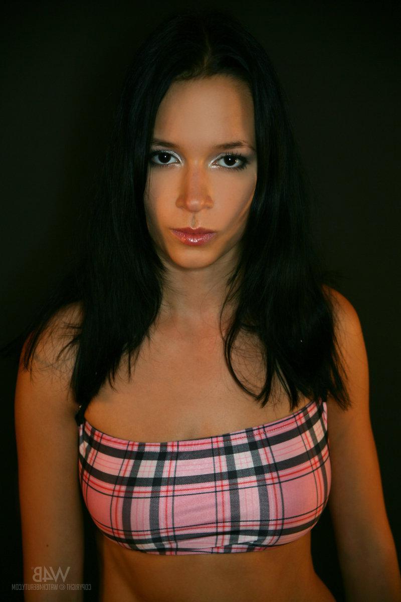 16P Brunette teen Gwen A teases in plaid chaps in "Bum"