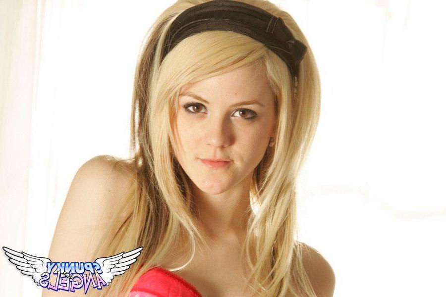 20P Pictures of a cute blond teen giving your cock a tease