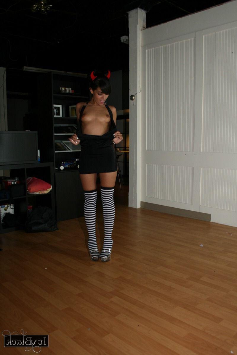 16P Pictures of Ivy Black teasing in striped socks