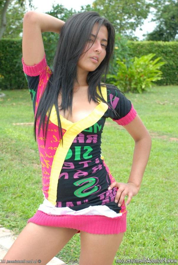 15P Pictures of latin teen Jennifer playing with her red toy outside