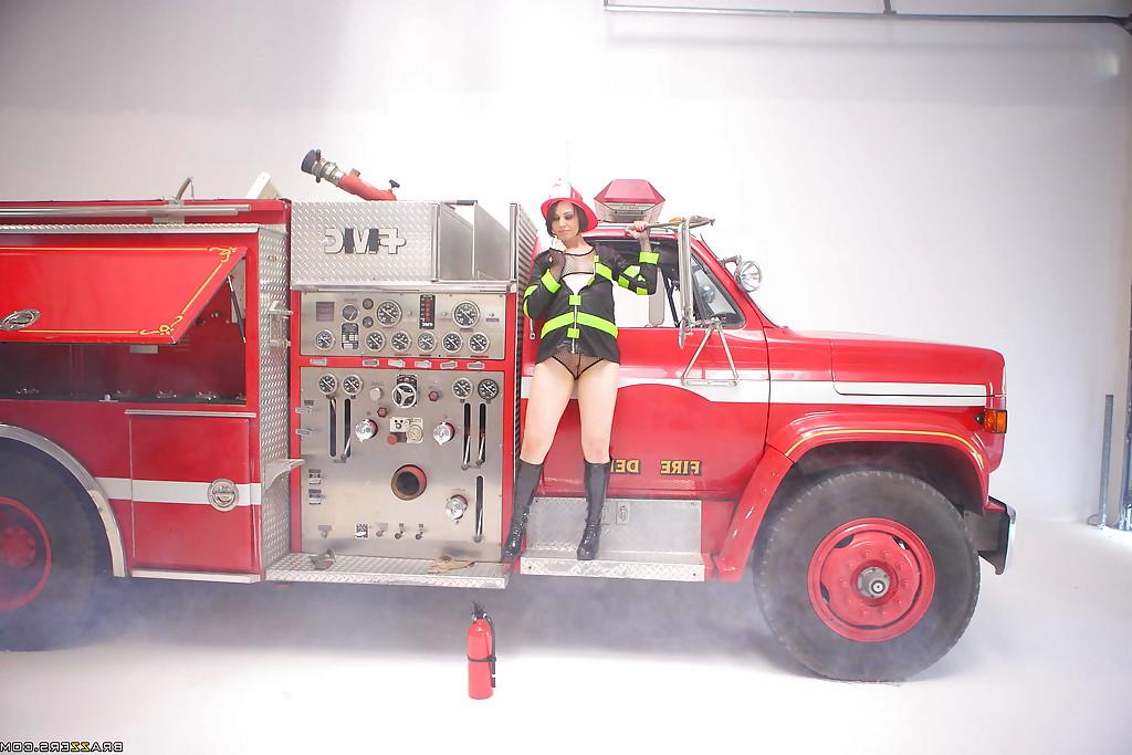 16P Hot Sarah Shevon is posing in panties and in firefighter's uniform