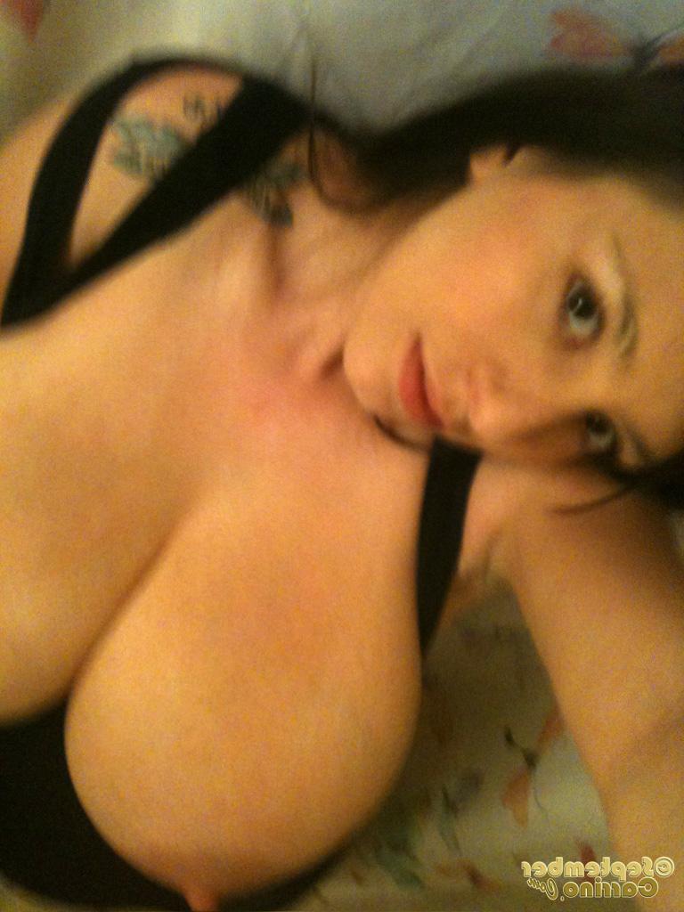 12P Amazingly lovely babe September Carrino showing off her big tits