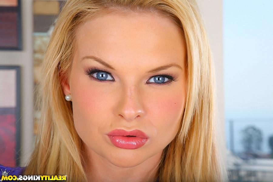 16P Hot and busty babe Tarra White demonstrates her gorgeous ass and tits