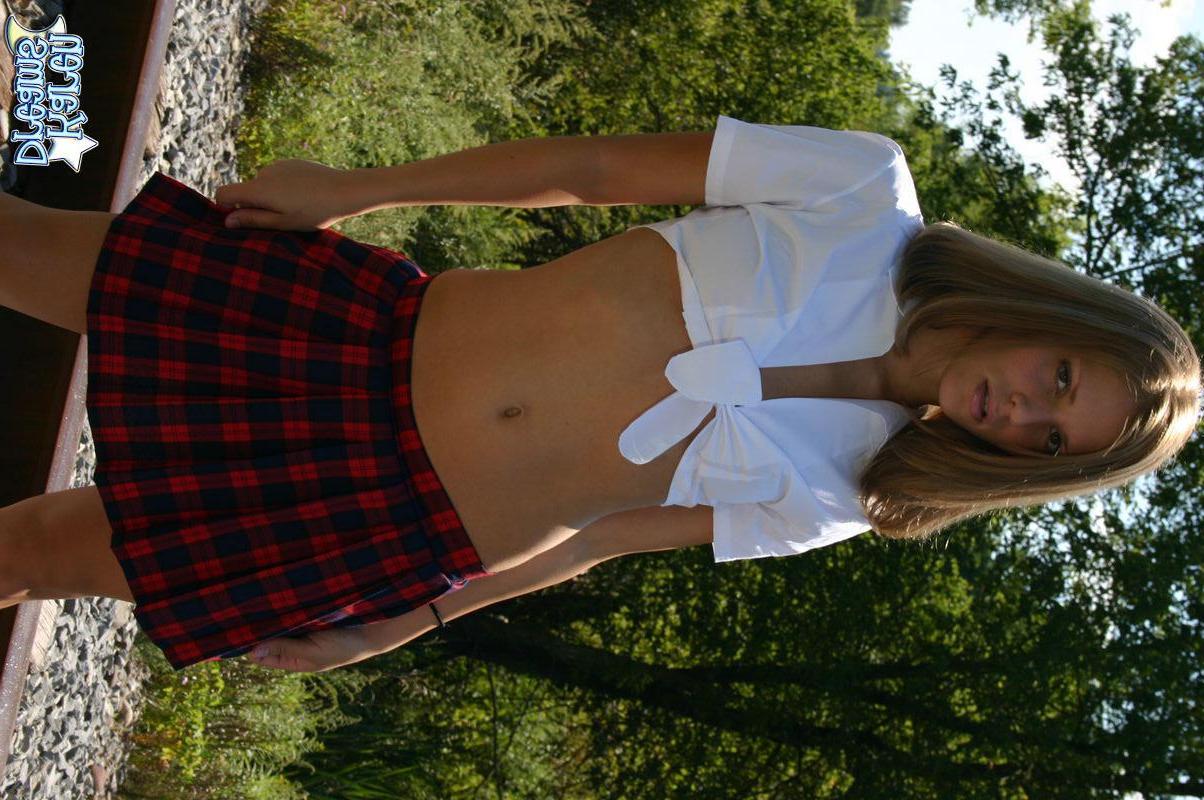 20P Pictures of Karen Dreams stripping out of her schoolgirl uniform