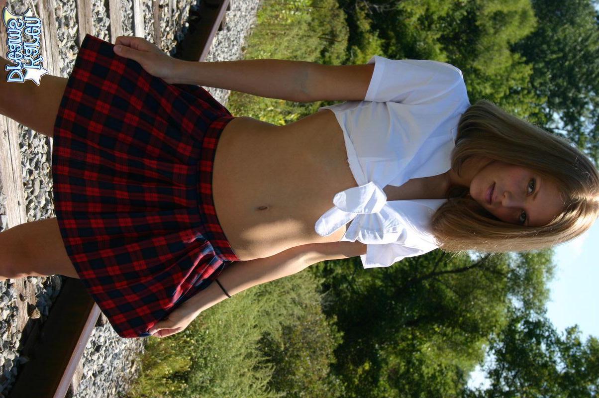 20P Pictures of Karen Dreams stripping out of her schoolgirl uniform