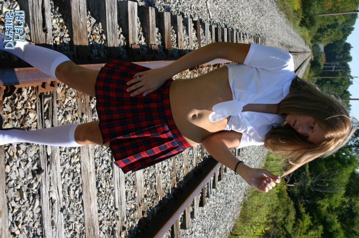 20P Pictures of Karen Dreams stripping out of her schoolgirl uniform
