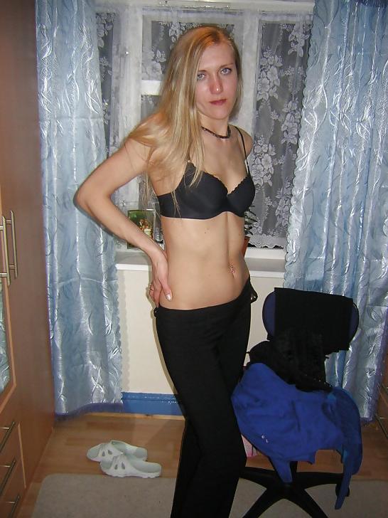24P Russian babe strips down and fucked