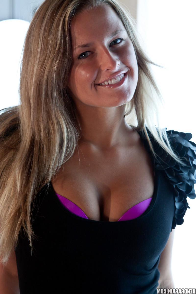 16P Kendra Rain strips out of her black dress to give you a hot tease
