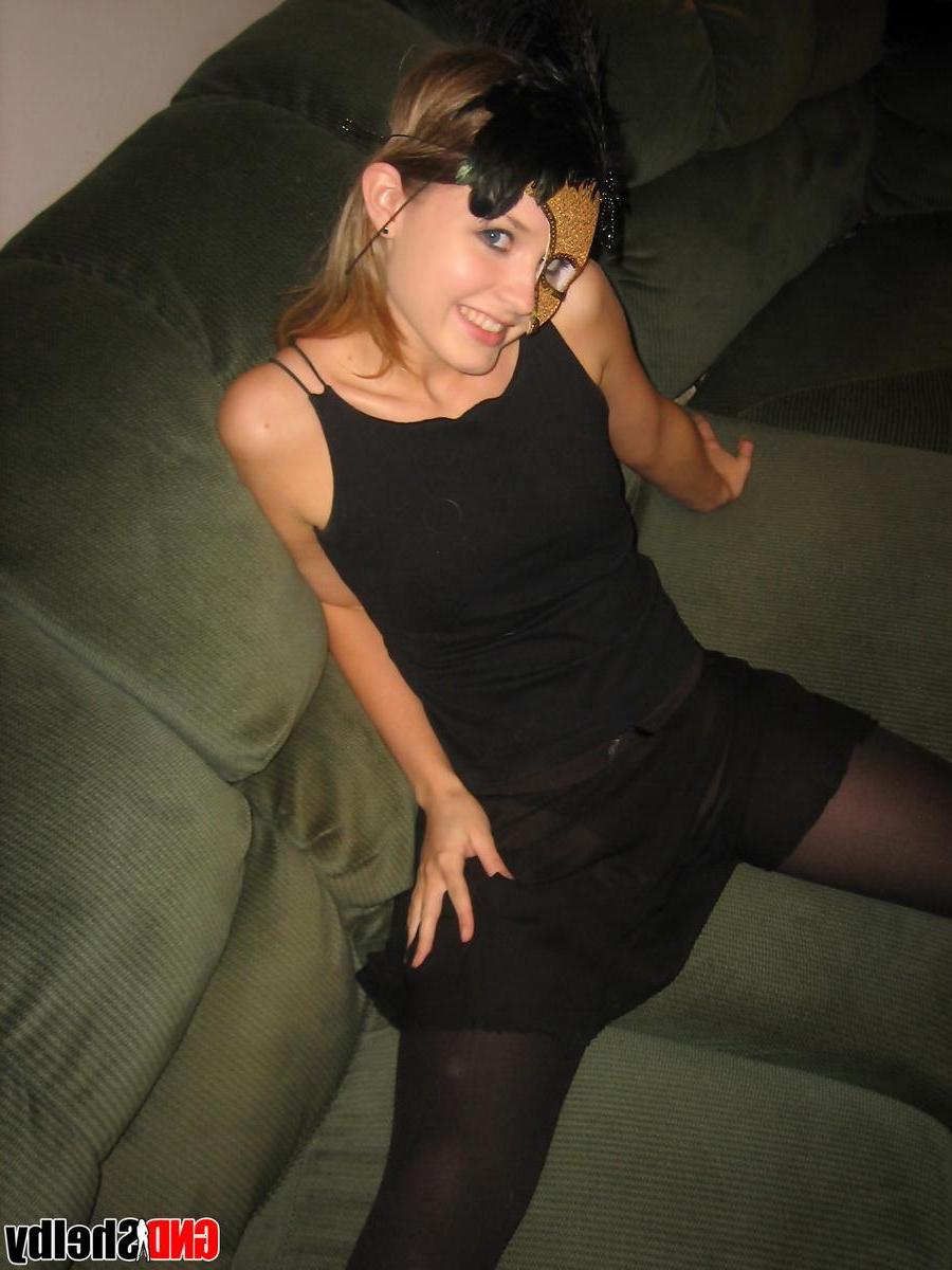 12P Shelby strips off her black dress and starts to rub her wet pussy