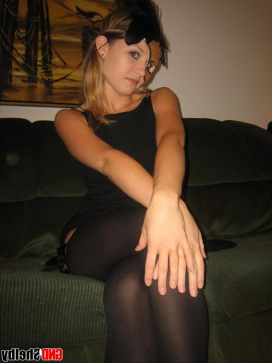 12P Shelby strips off her black dress and starts to rub her wet pussy