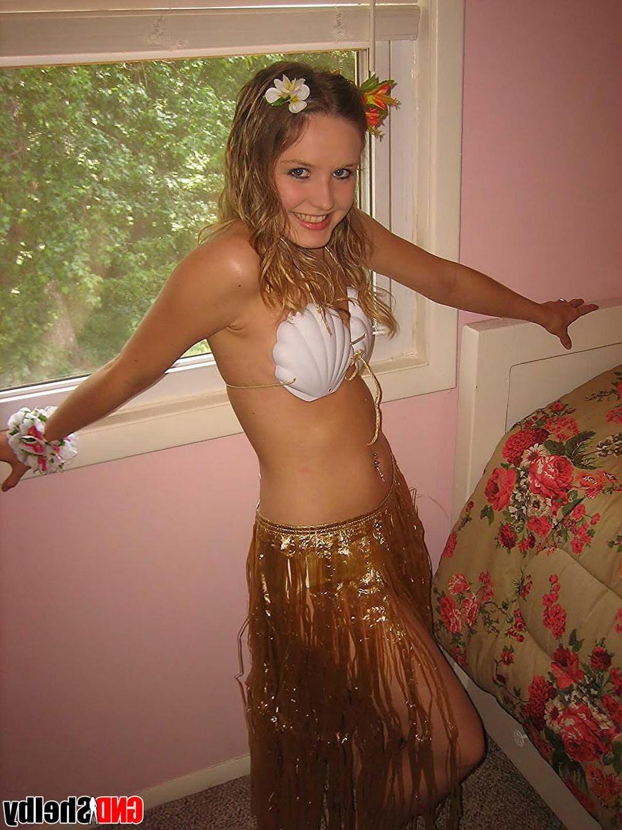 11P Petite teen Shelby strips out of her skimpy hula girl costume exposing her perky perfect tits