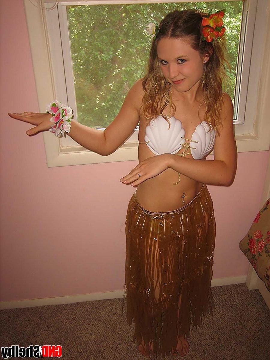 11P Petite teen Shelby strips out of her skimpy hula girl costume exposing her perky perfect tits