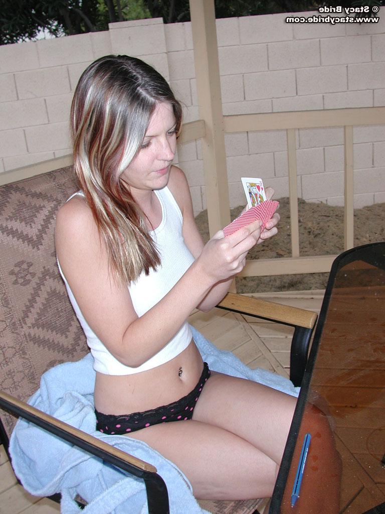 20P Pictures of teen model Stacy Bride playing strip poker with her friends