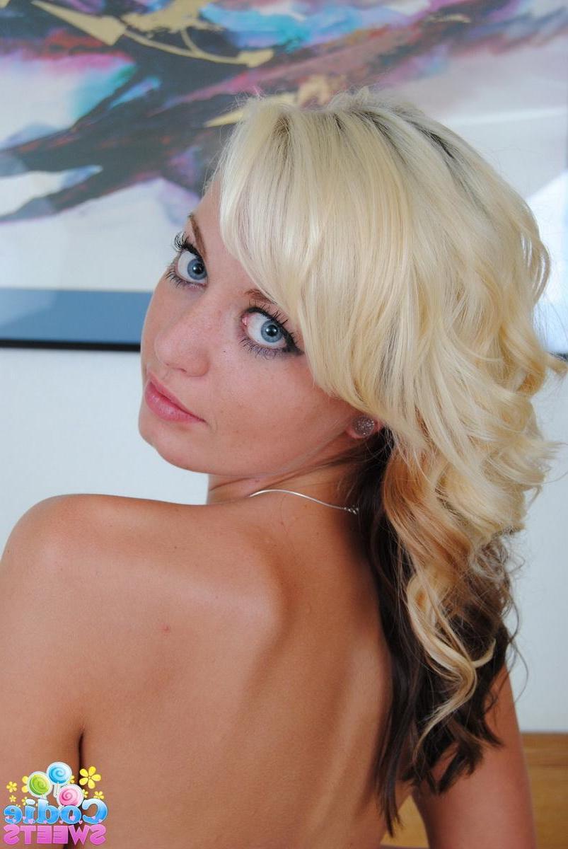 12P Blonde perfect teen Codie Sweets strips off her black sheer lingerie in bed
