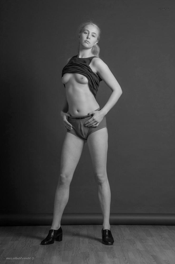 12P Blonde model Mae strips nude in black and white