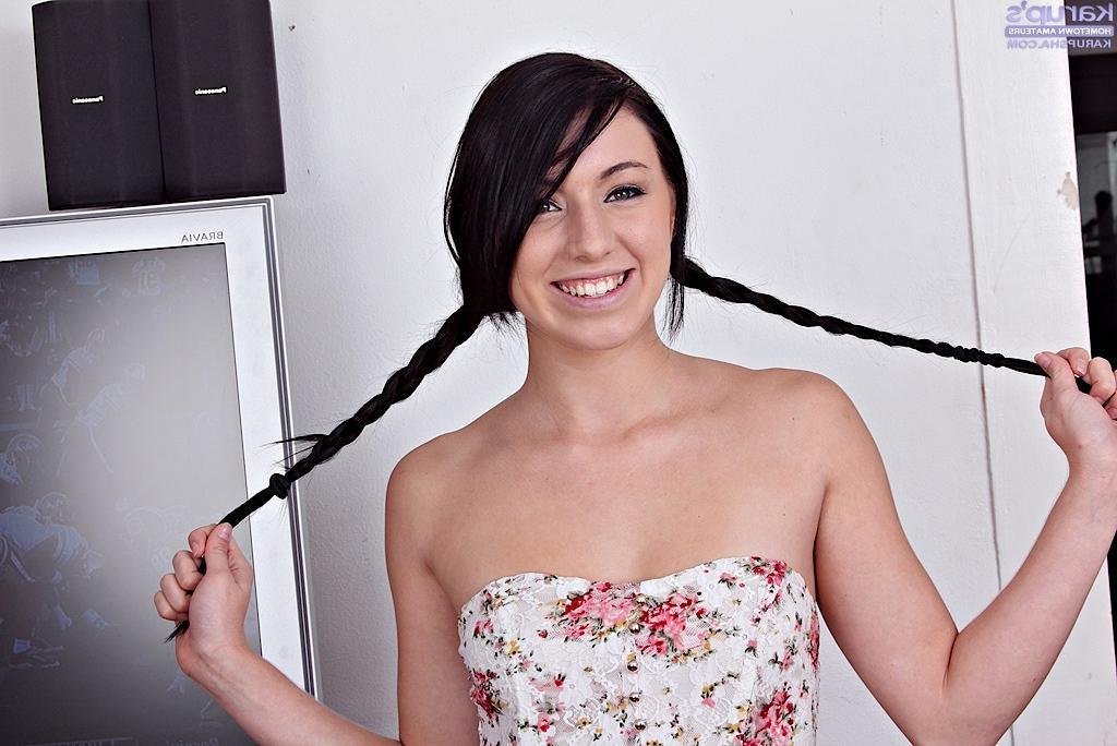 15P Beautiful teen Megan Piper looks cute in pigtails as she toys her tight pussy