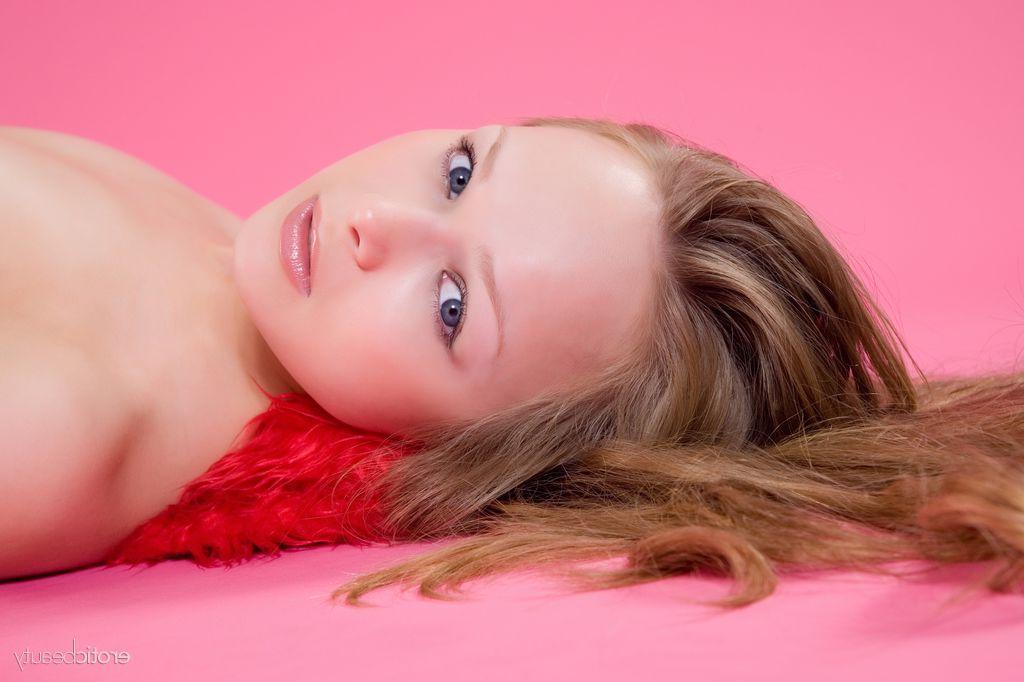 16P Blonde teen Mia C puts on her white fishnet stockings to seduce you