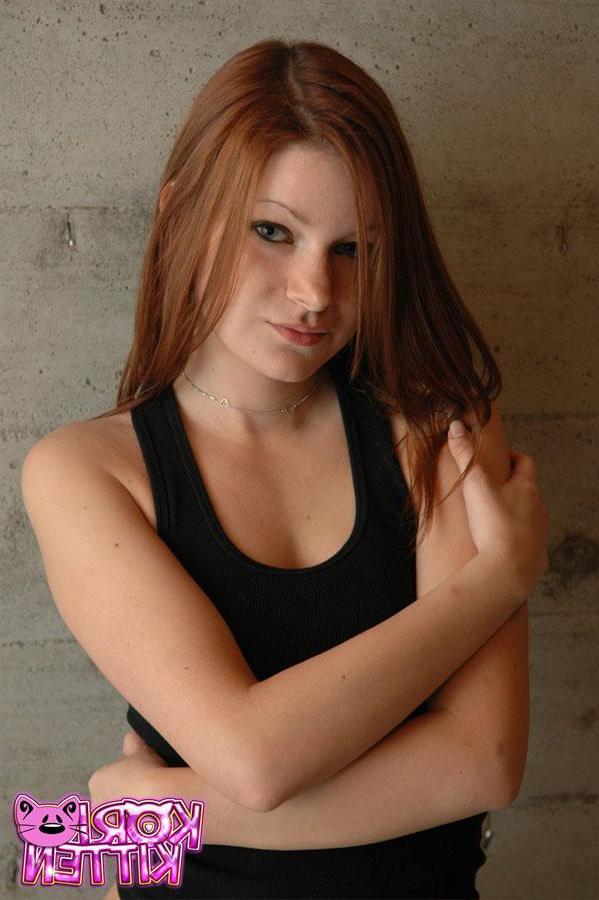 12P Redhead teen Kori Kitten poses in her red and black panties