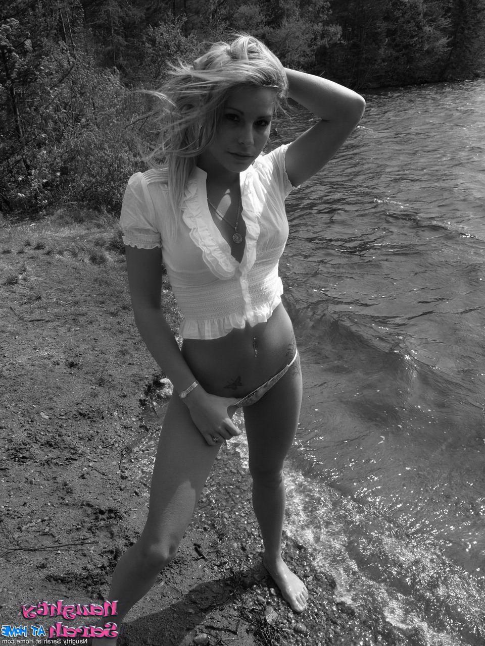 15P Pictures of Naughty Sarah on the beach in black and white