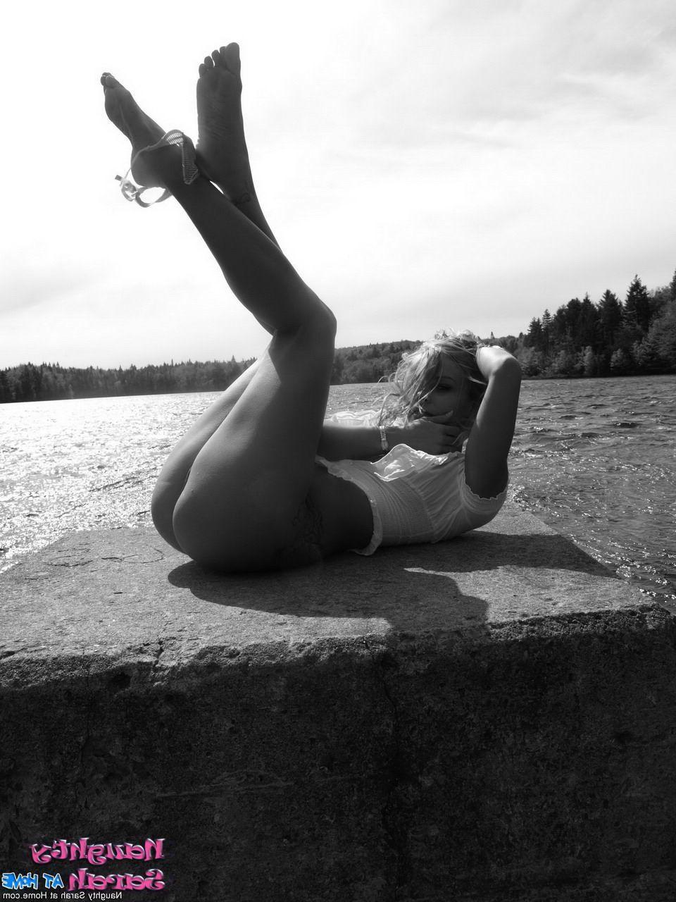 15P Pictures of Naughty Sarah on the beach in black and white