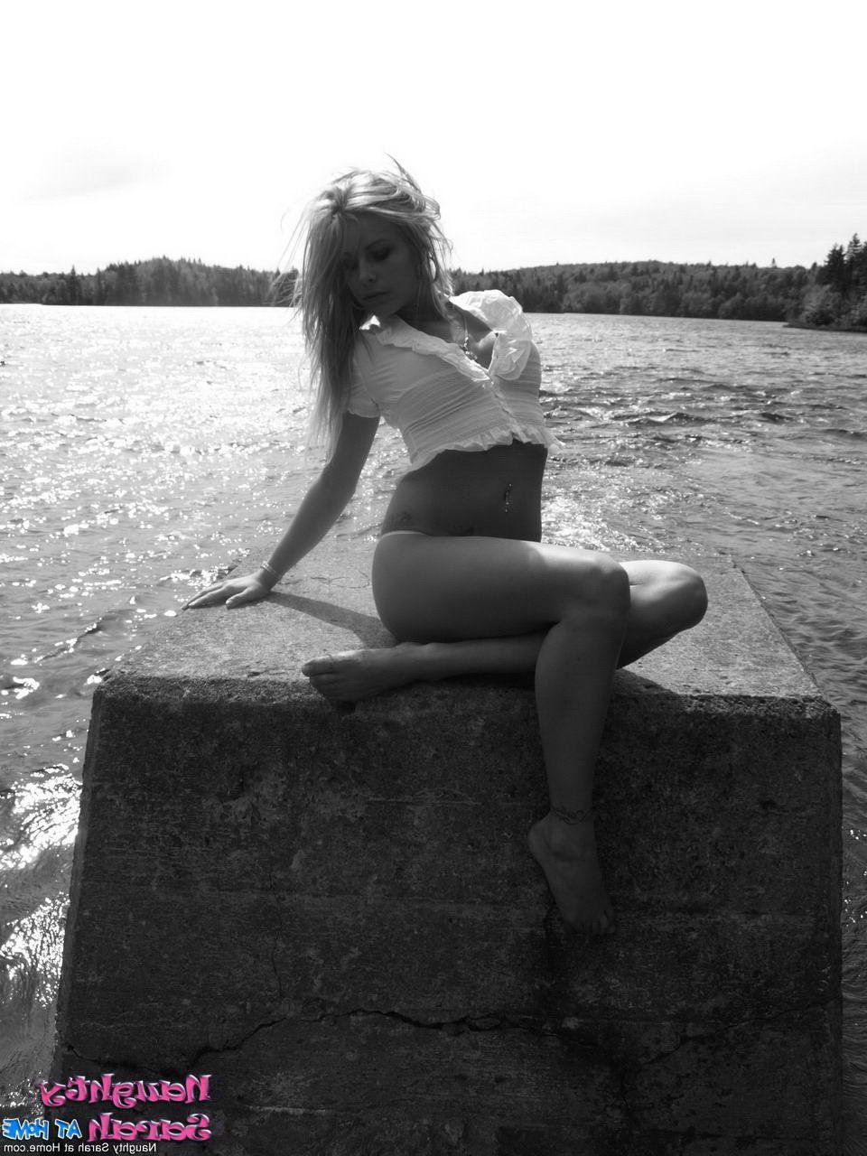 15P Pictures of Naughty Sarah on the beach in black and white