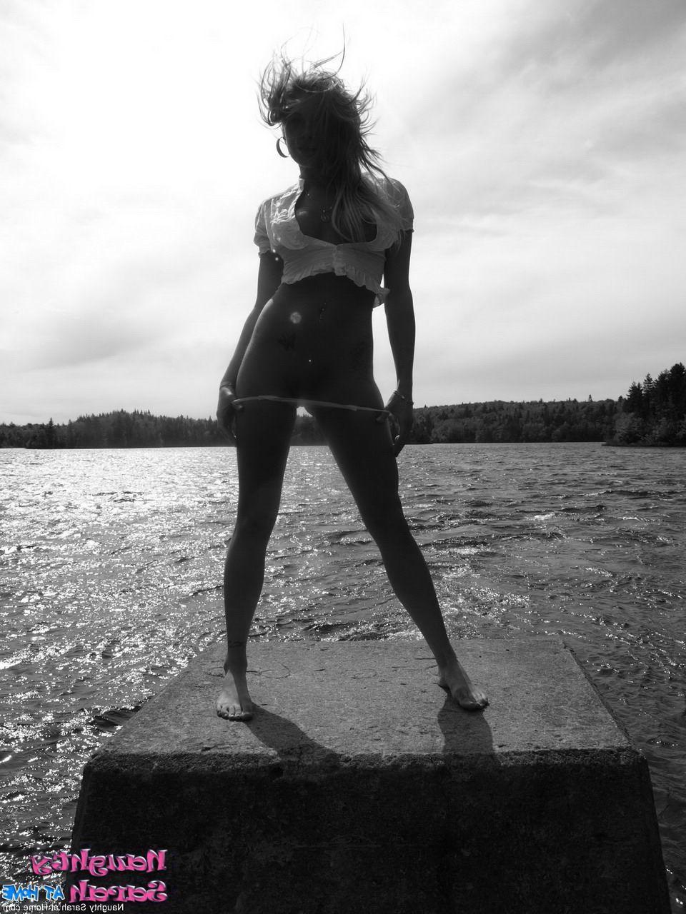 15P Pictures of Naughty Sarah on the beach in black and white
