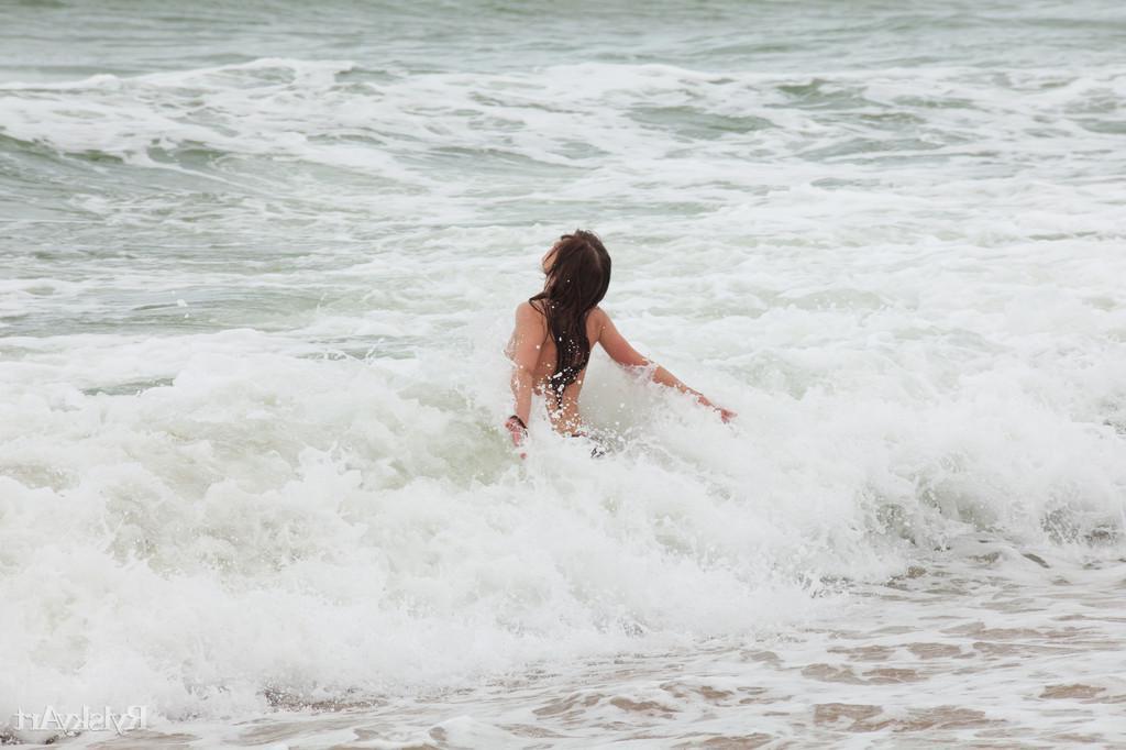 16P Pictures of hot teen girl Nedda enjoying her nakedness on a beach