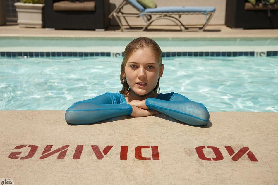8P Blonde teen Nola Barry goes swimming in a sheer top