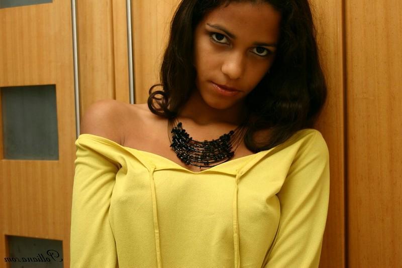 16P Pictures of latin teen Polliana teasing in a yellow shirt