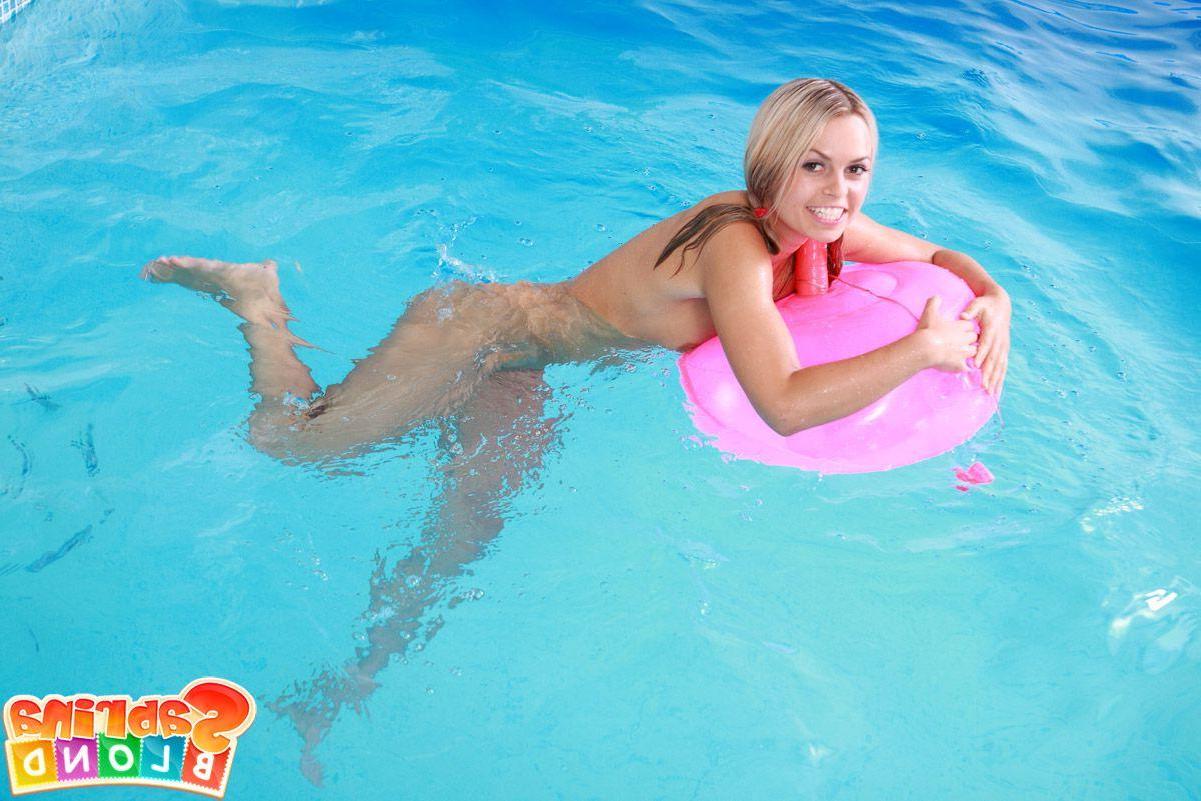 15P Pictures of teen hottie Sabrina Blond getting naughty by the pool