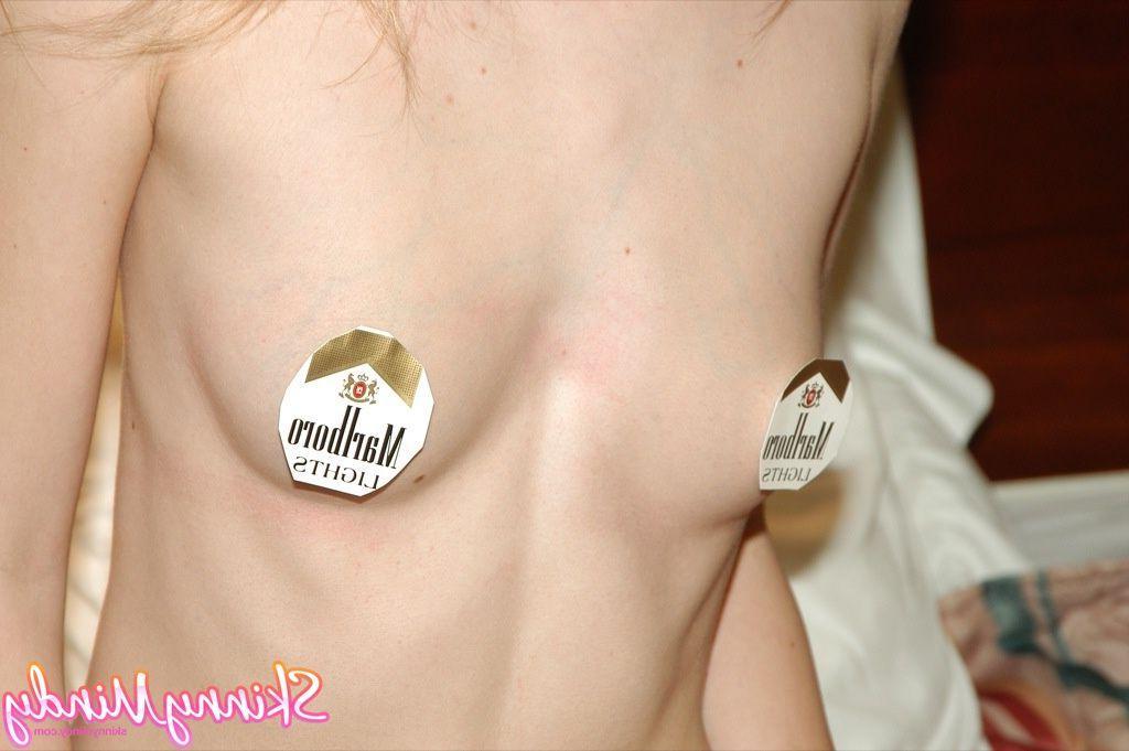 20P Pictures of teen porn girl Skinny Mindy smoking a cigarette