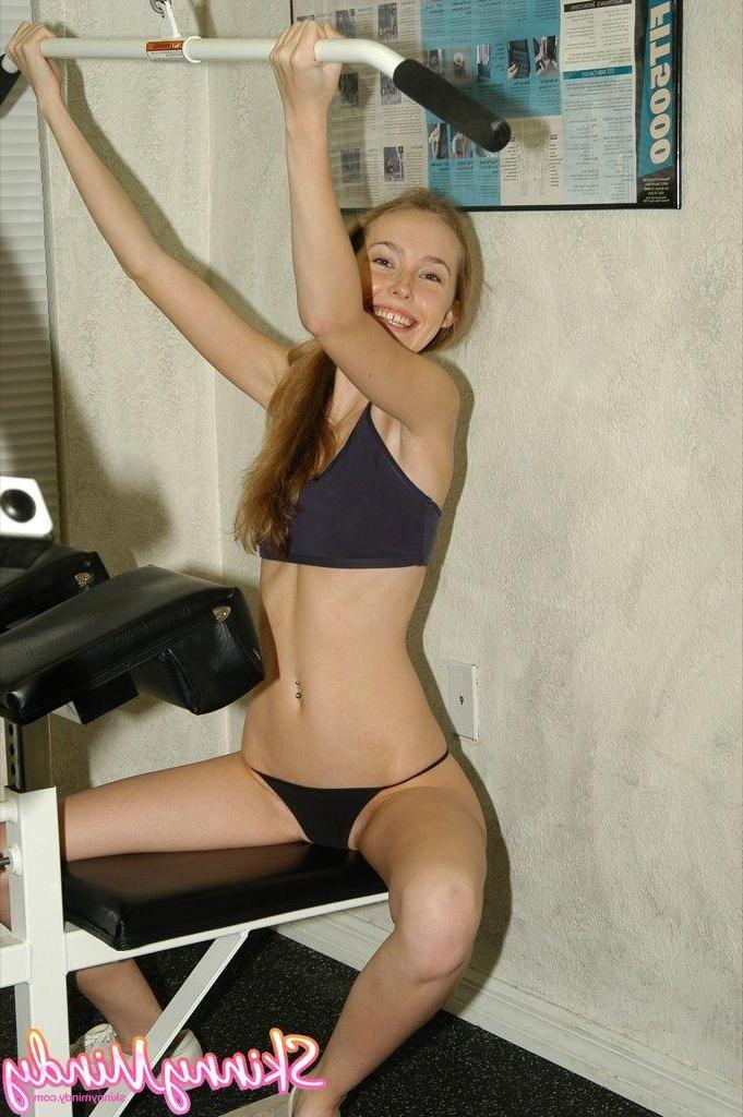 20P Pictures of teen chick Skinny Mindy getting hot in the gym