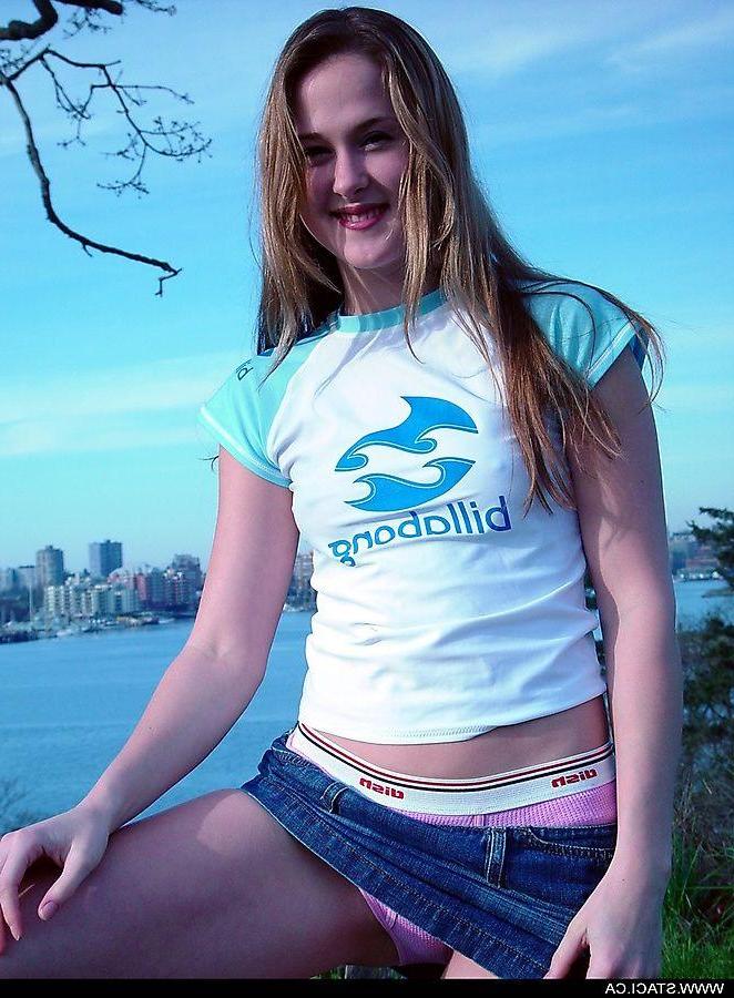 20P Pictures of Staci.ca taking off her shirt outside