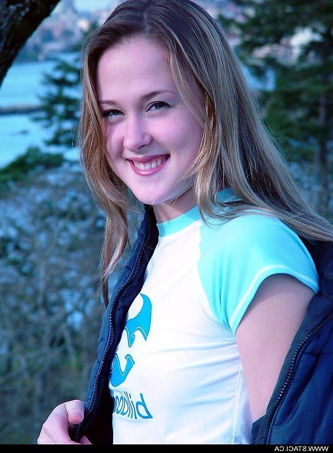 20P Pictures of Staci.ca taking off her shirt outside