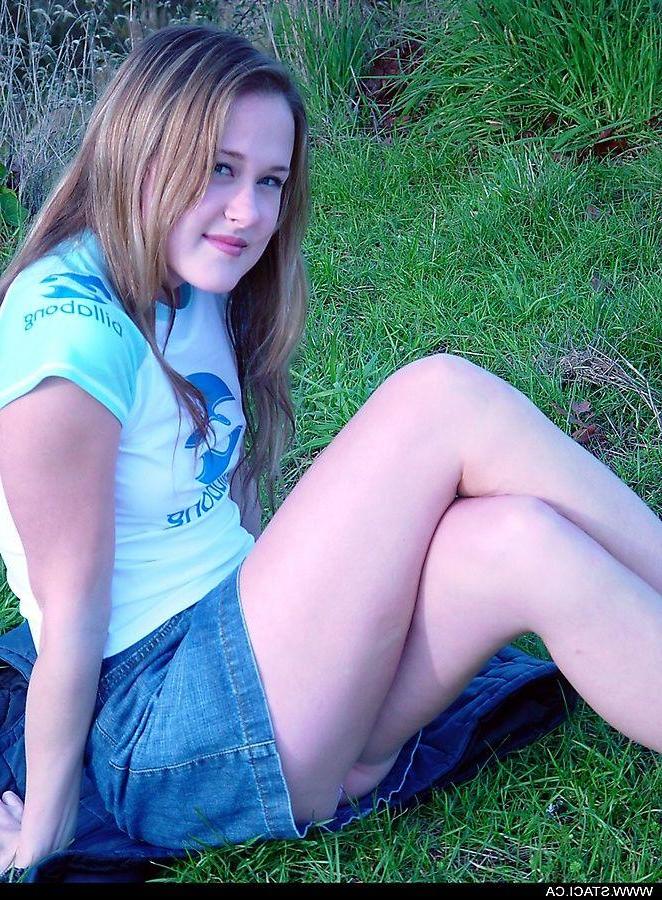 20P Pictures of Staci.ca taking off her shirt outside