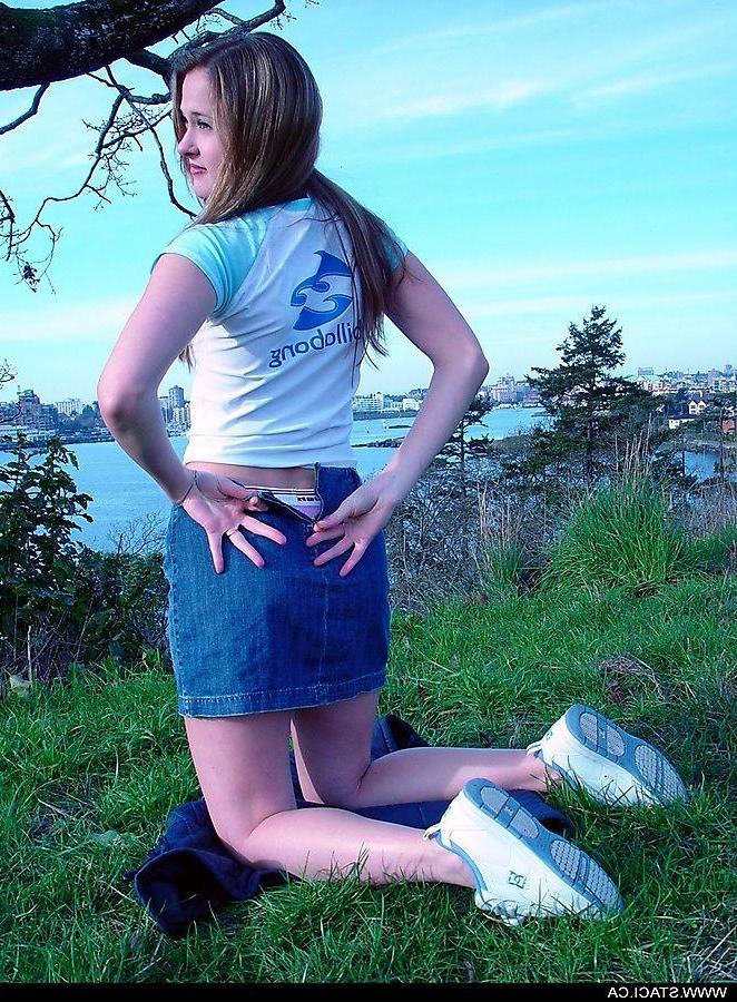 20P Pictures of Staci.ca taking off her shirt outside