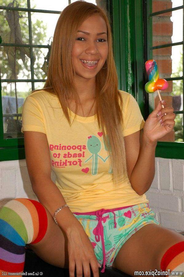15P Pictures of teen Tania Spice pleasuring herself with a vibrator